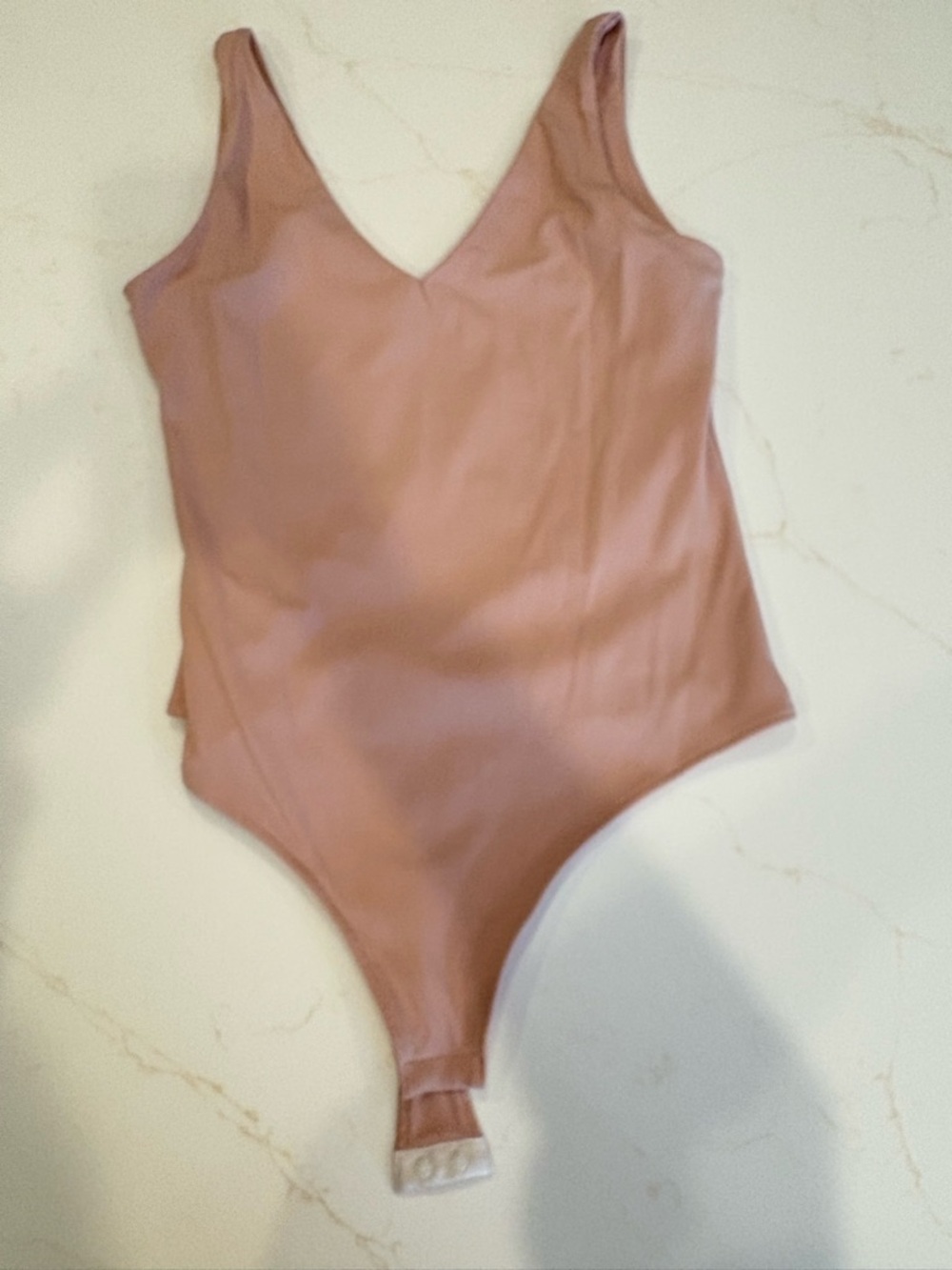 Women’s pink double v tank bodysuit